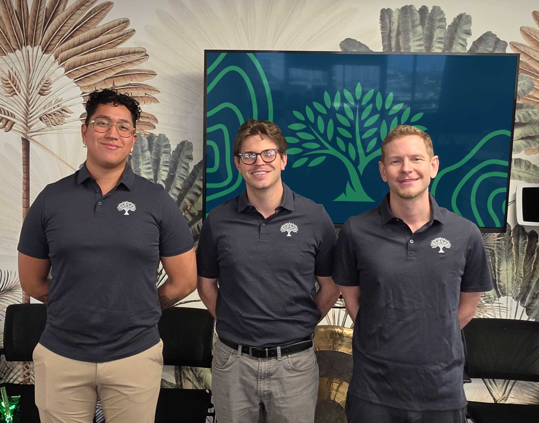Three Tree of Life Funding team members in the Honolulu office